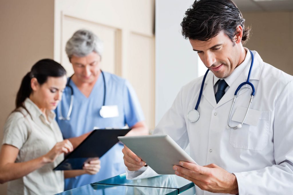 doctor using ipad